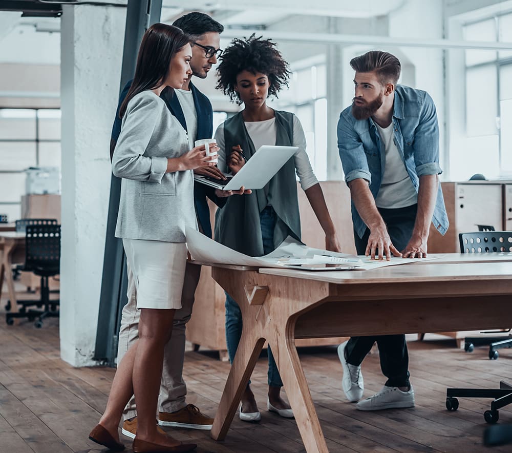 businesses streamlining their process group of coworkers working together